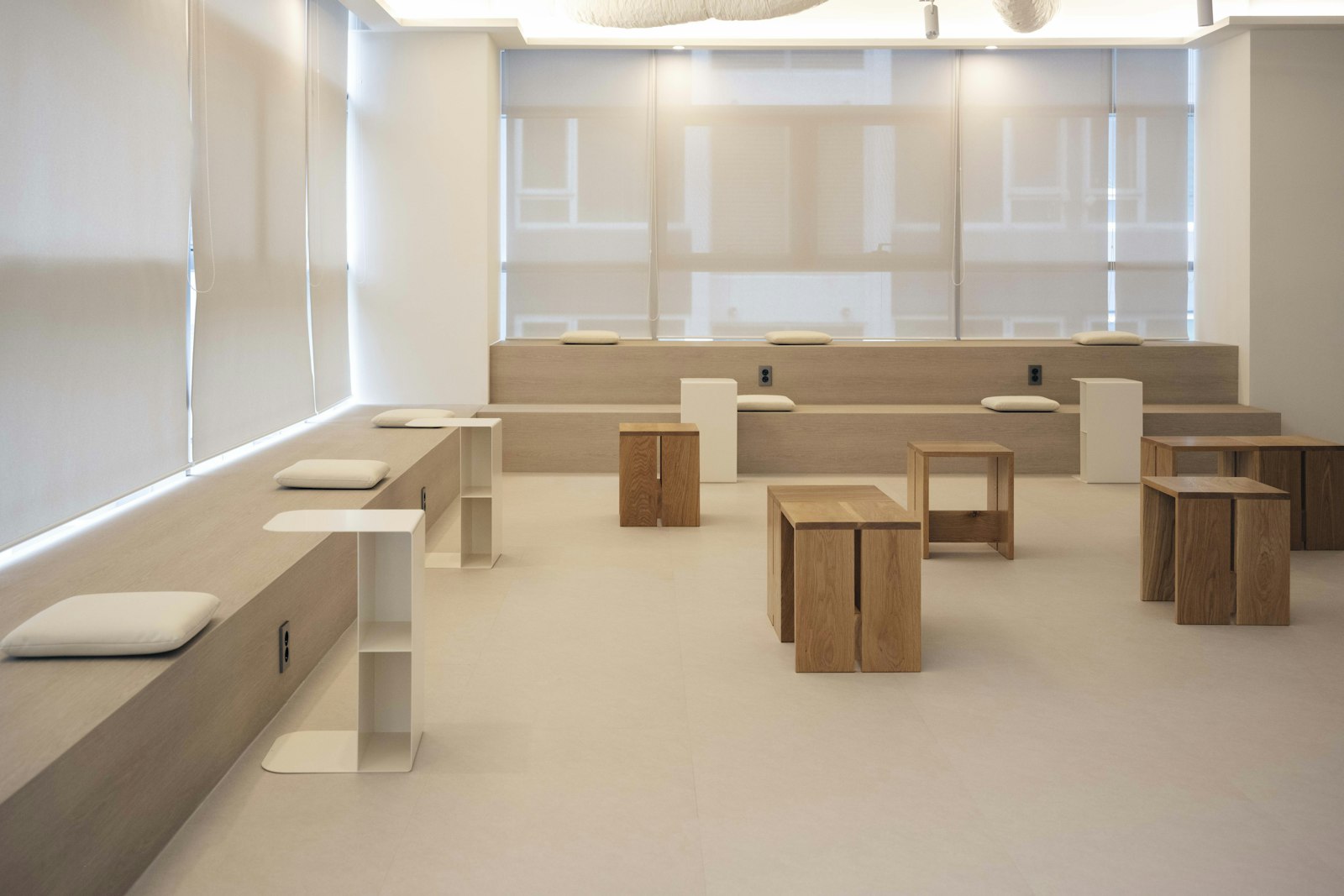Bright, minimal workspace with wooden furniture